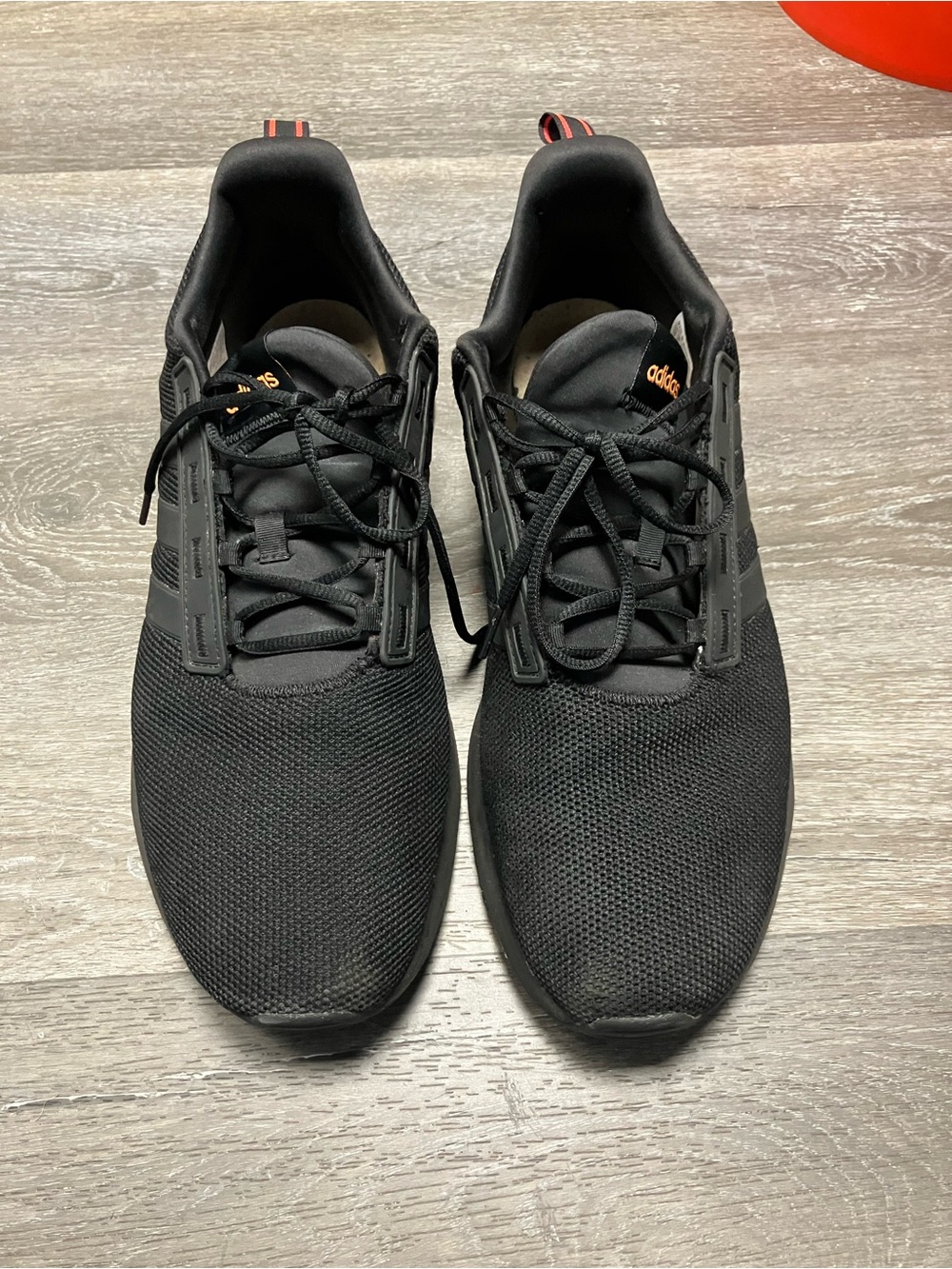 adidas Men's Black Mesh Athletic Sneakers with Subtle Orange Accents